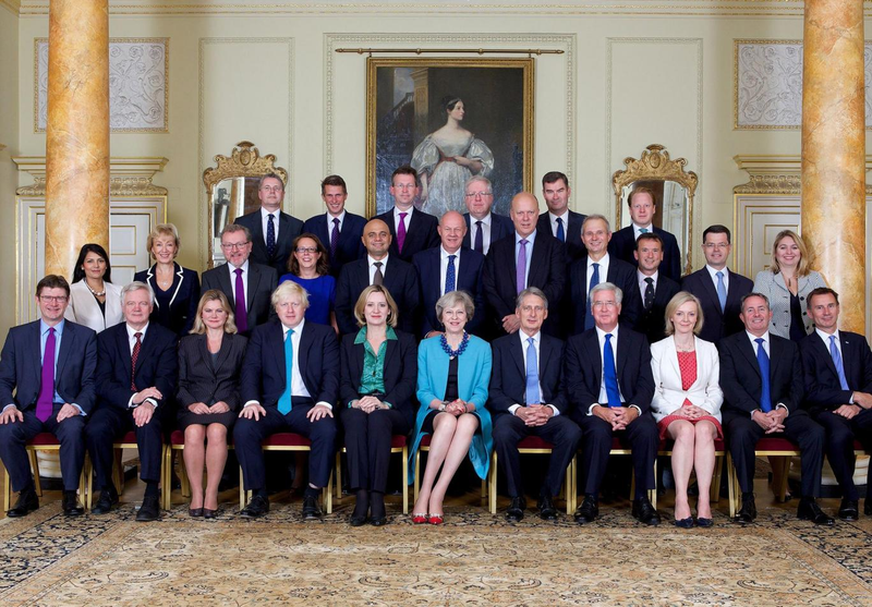 Illustration for article titled That Viral Photo of Theresa May With The Scream Painting is Totally Fake